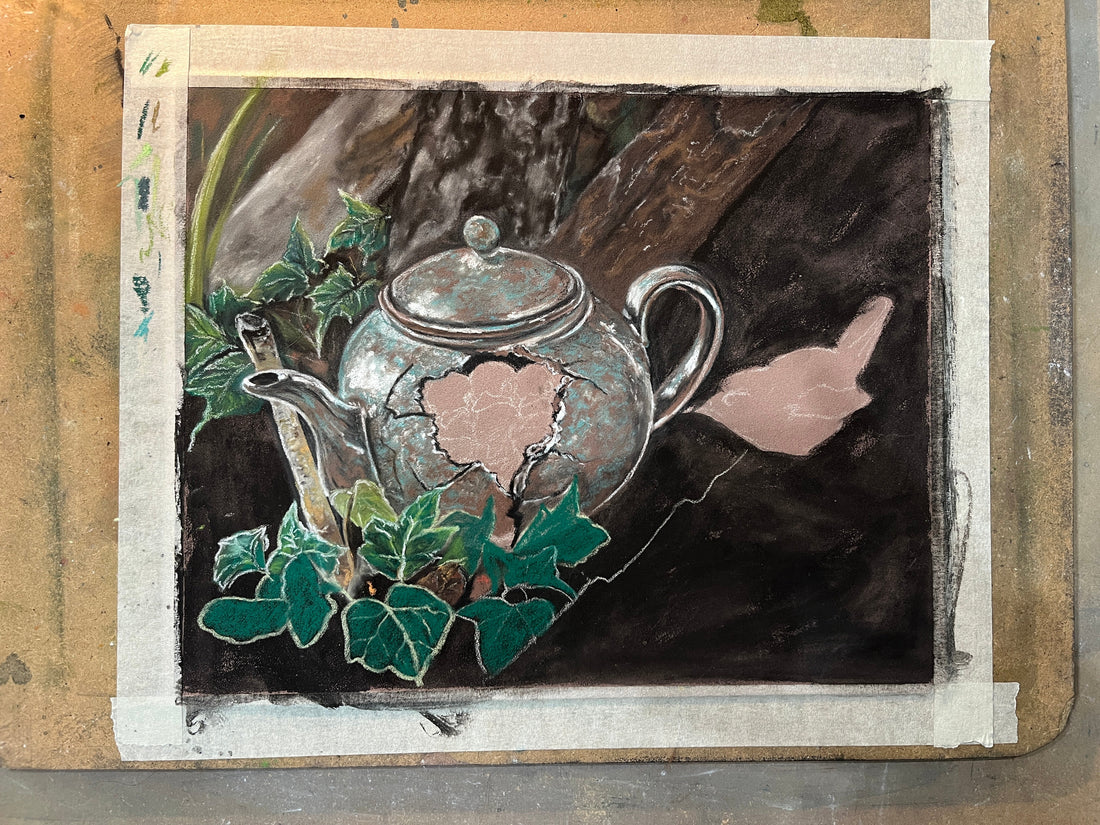 unfinished artwork showing broken teapot in woodland
